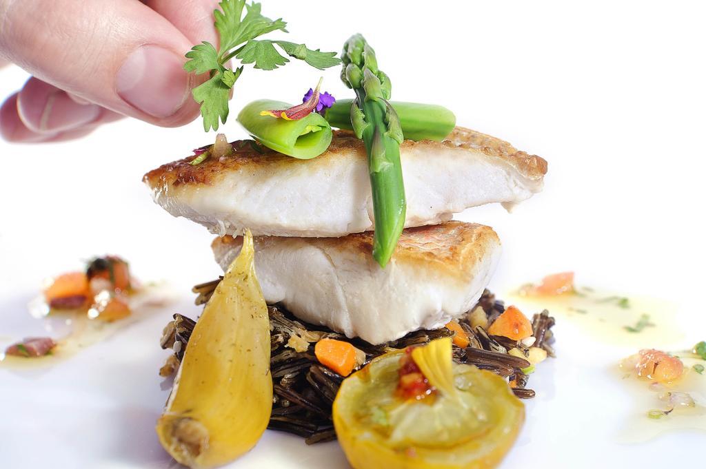Sun City Hotel - The Gabriel Kaherah Luaran gambar A prepared dish of halibut