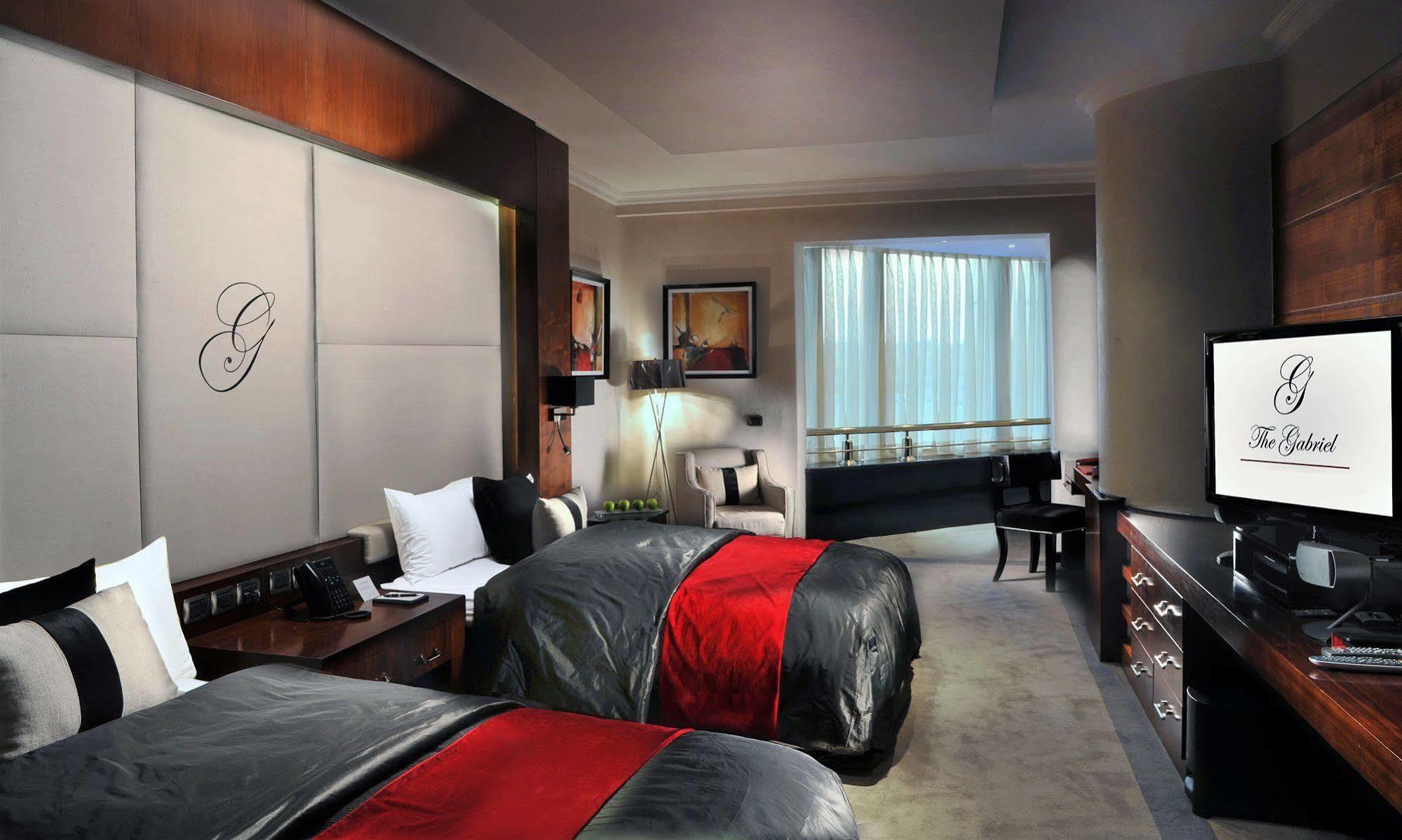 Sun City Hotel - The Gabriel Kaherah Luaran gambar A room at the G Tower